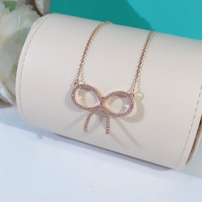 [Lumi Jewelry]CLAW SET RHODIUM PLATED BOW NECKLACE