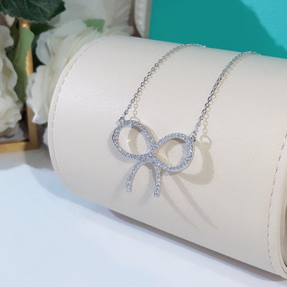 [Lumi Jewelry]CLAW SET RHODIUM PLATED BOW NECKLACE